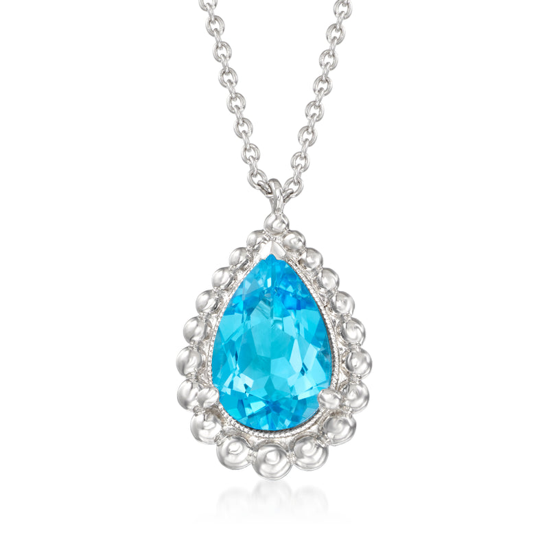 Sterling silver teardrop blue topaz pendant necklace with halo setting