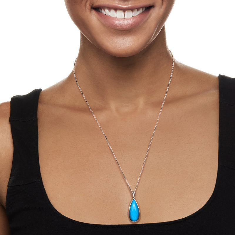 Sterling silver necklace with small teardrop turquoise pendant on chain