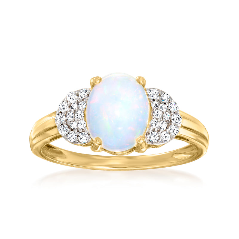 Oval opal and diamond ring in 14kt yellow gold, 3-stone halo, polished band
