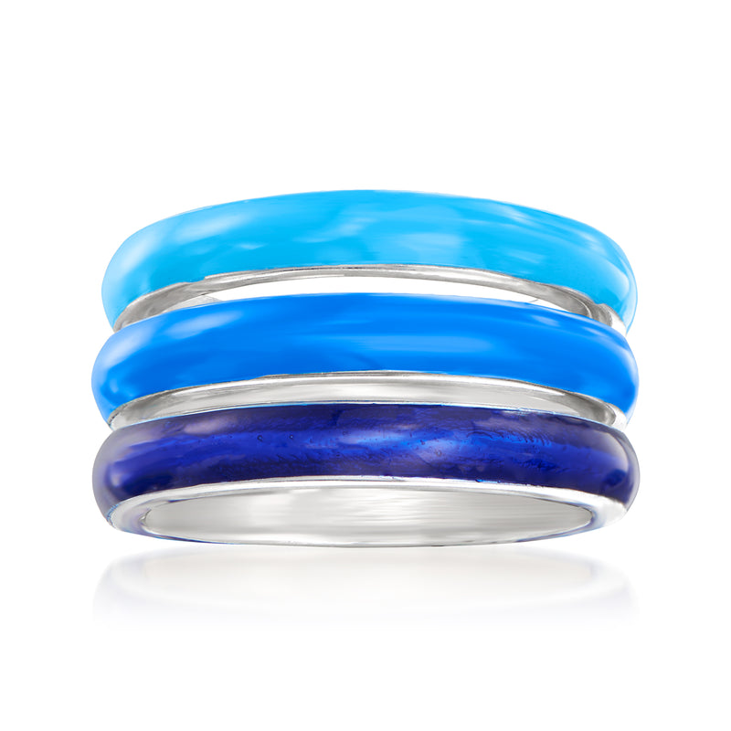 Three stackable rings with blue enamel and sterling silver bands