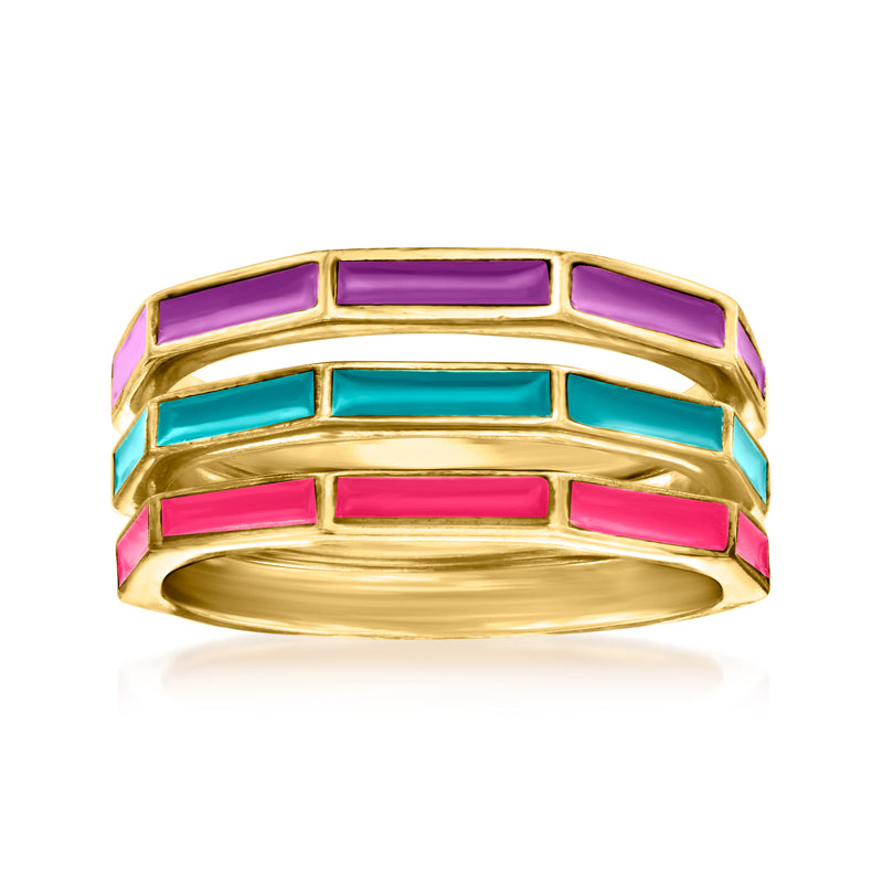 Three geometric enamel rings in gold tone with purple, teal, and pink rectangular panels