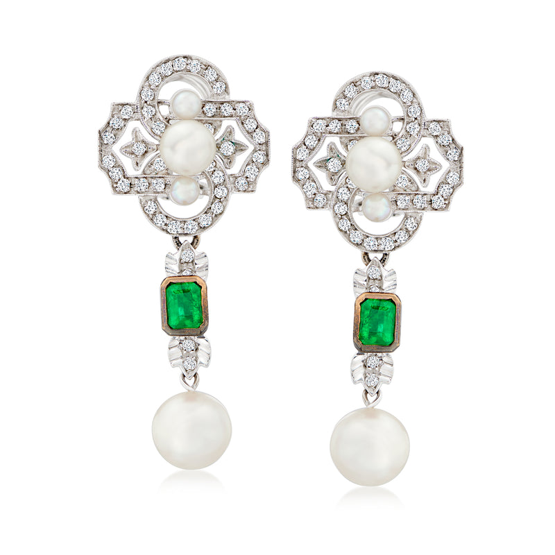 Pearl drop earrings with round white pearls, green emerald squares, and diamond-like accents