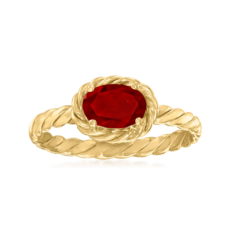 Garnet twisted ring in 10kt yellow gold, red oval center stone in braided rope setting