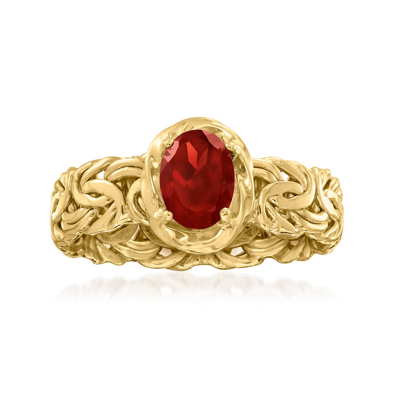 10k yellow gold Byzantine ring with oval red garnet centerpiece and braided details