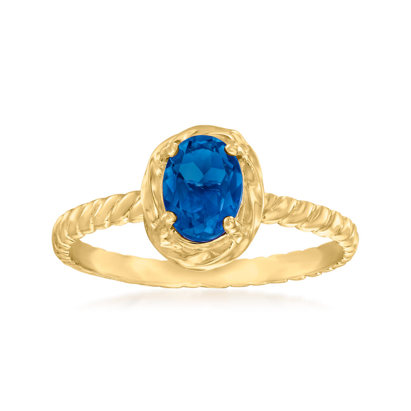 10kt yellow gold ring with oval London blue topaz and twisted band detail