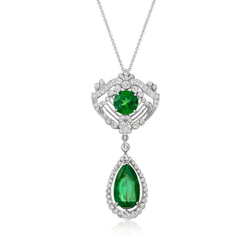 White gold pendant necklace with oval green tourmalines and diamond halo settings
