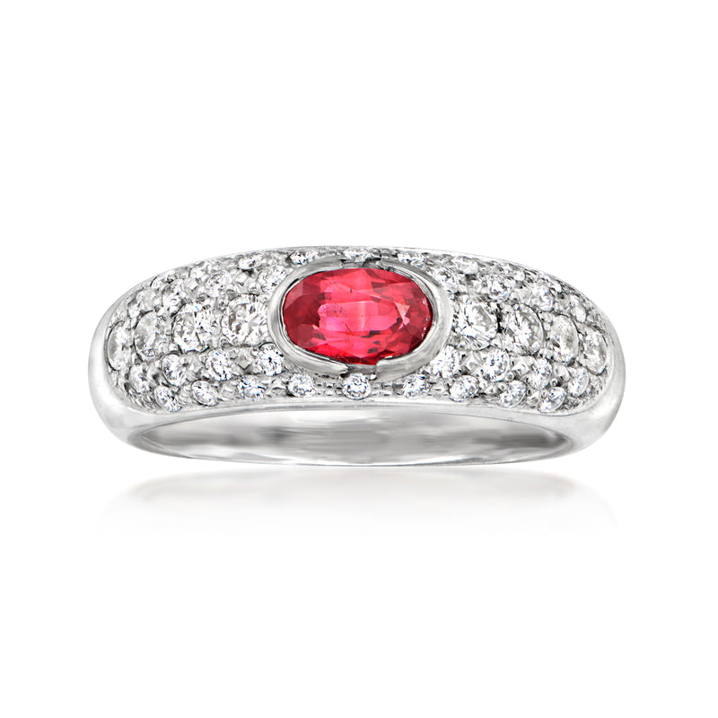 Vintage white gold ring with oval red garnet and pavé diamonds