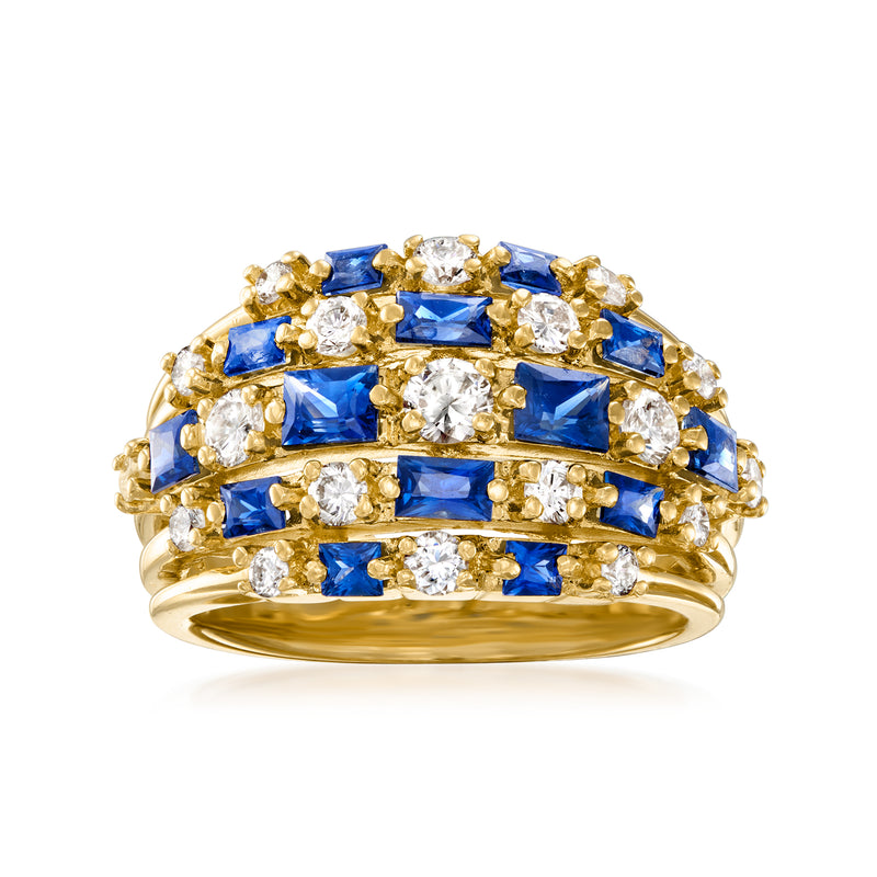 18kt yellow gold vintage ring with blue rectangular sapphire and white diamond accents