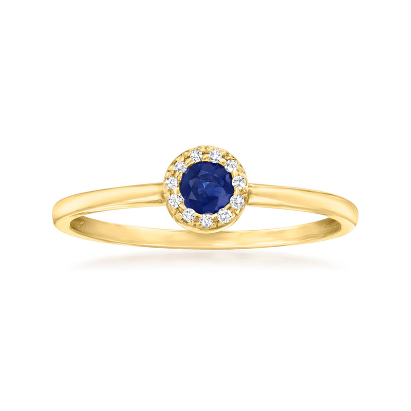 14kt yellow gold ring with round blue sapphire center and diamond halo accents