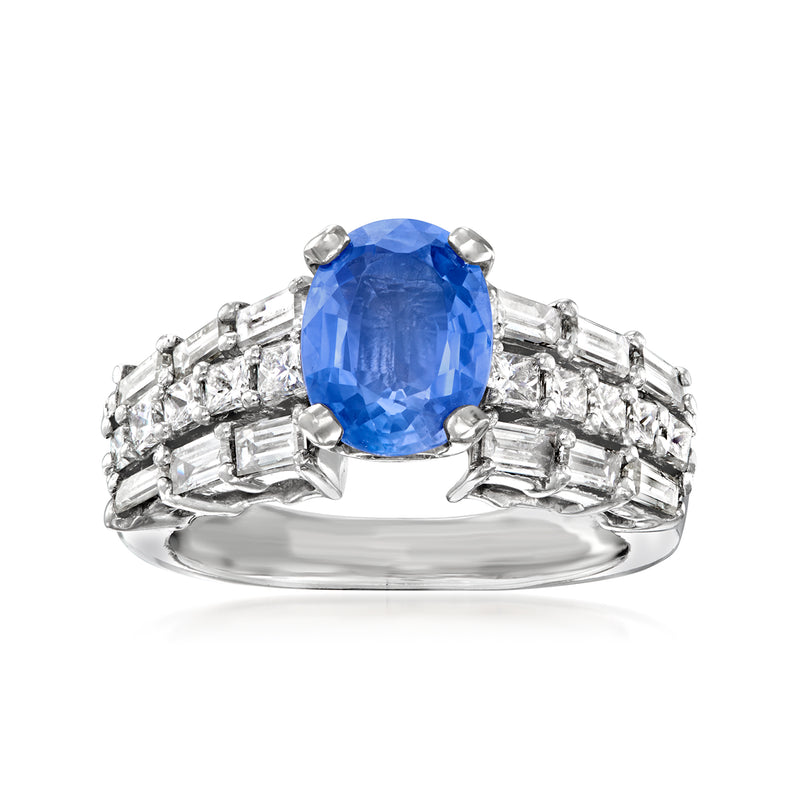 Platinum ring with blue sapphire and baguette diamonds