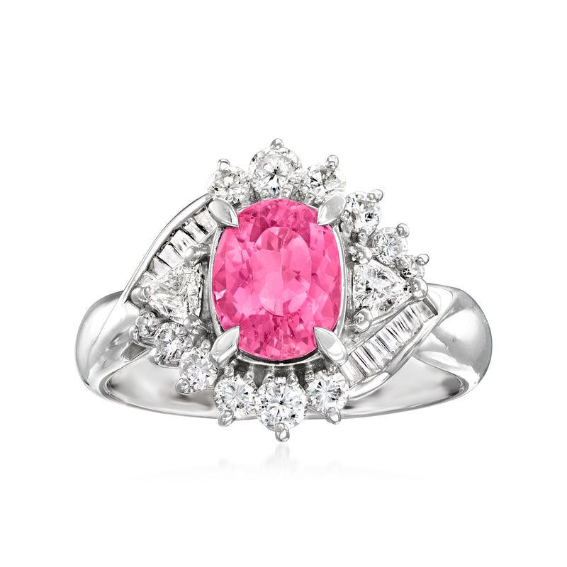 Vintage platinum ring with oval pink tourmaline center and diamond halo, prong-set