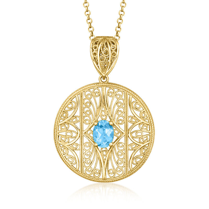 Gold-tone filigree pendant necklace with round blue gemstone, delicate chain