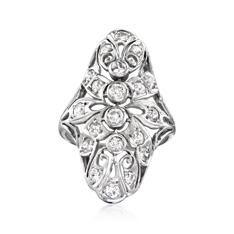 Vintage filigree diamond ring in white gold with oval oval and round diamond clusters