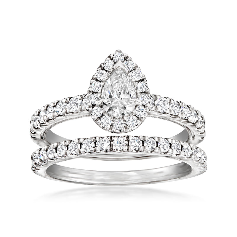14kt white gold diamond bridal set with round center stone and pave band