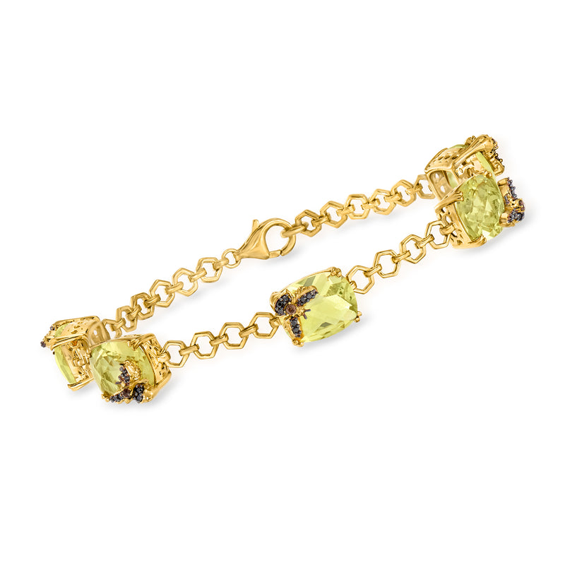 Gold-tone chain bracelet with three lemon-yellow gemstones and small blue accents