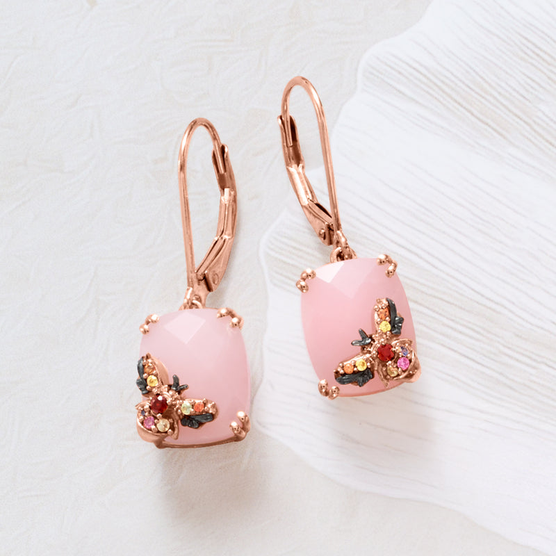 Rose gold leverback earrings with pink oval drops and colorful floral/bee accents