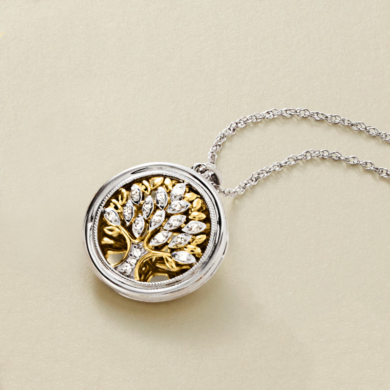 Round two-tone diamond Tree of Life locket close-up with gold tree and white stones