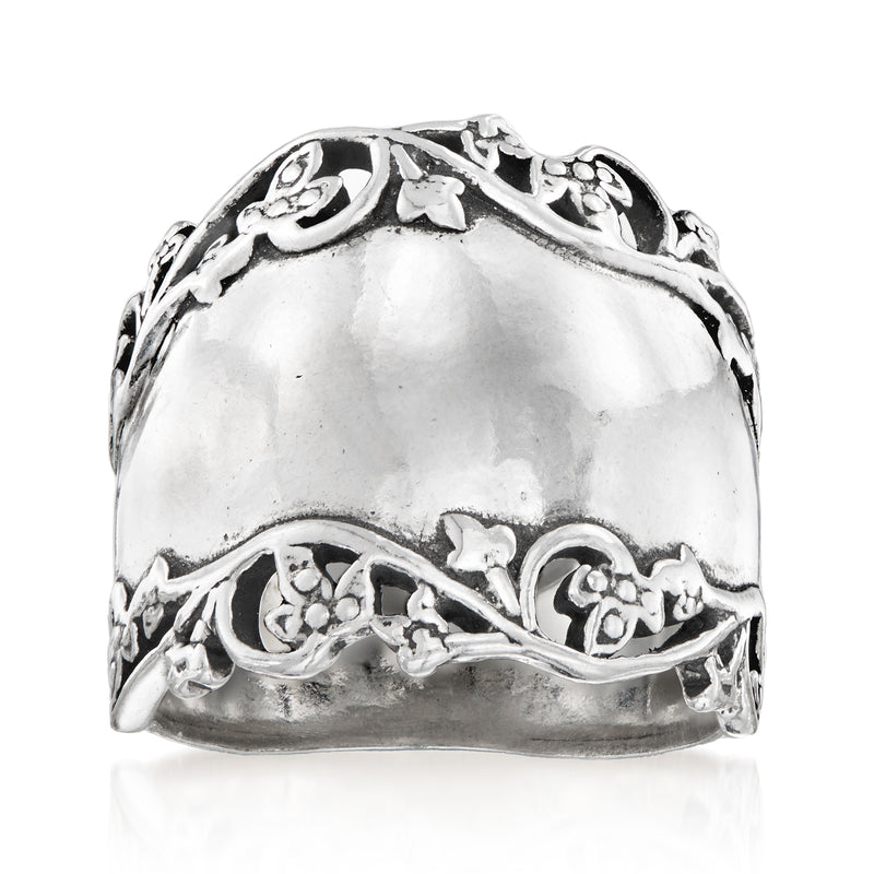 Sterling silver hammered band ring with floral engravings and scroll details