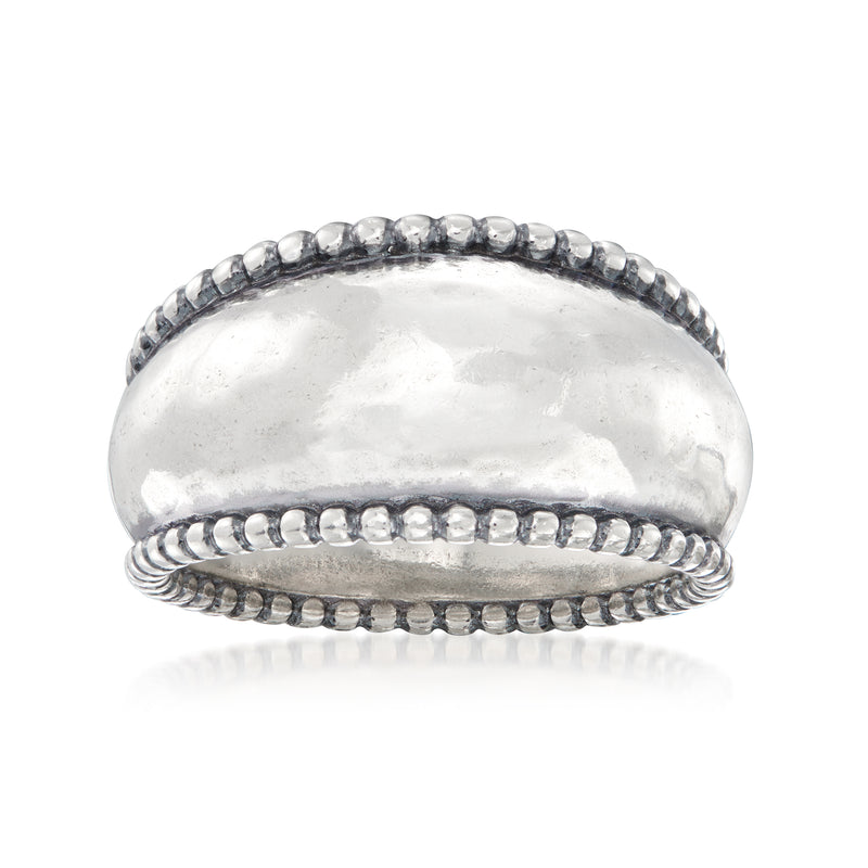 Sterling silver hammered ring with raised bead trim on the band
