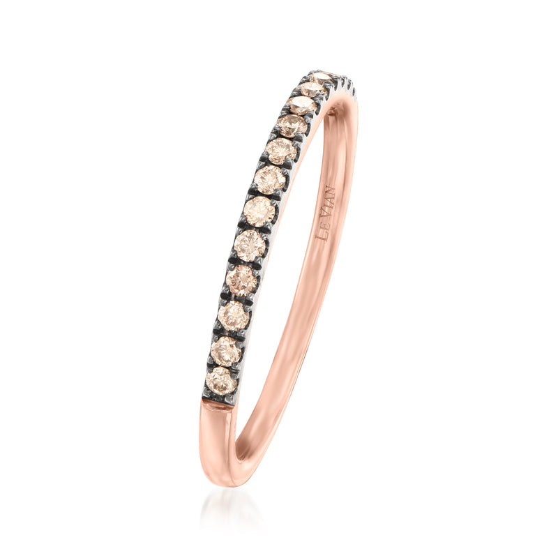 Rose gold curved band with round diamond clusters along the top, side view