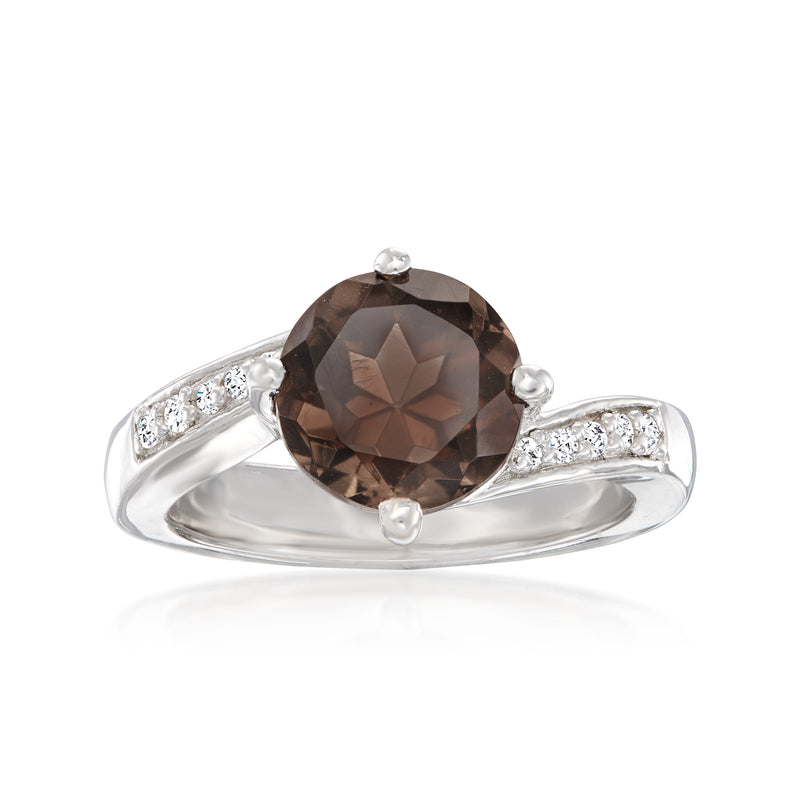 Sterling silver ring with large faceted smoky quartz center and white topaz side stones