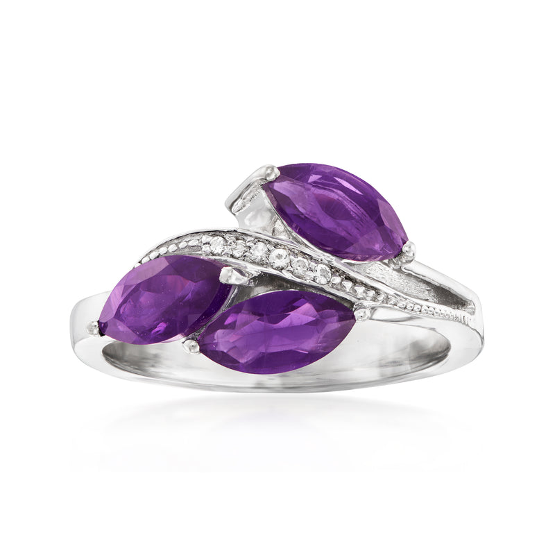Sterling silver ring with three marquise amethyst stones and glittering white accents