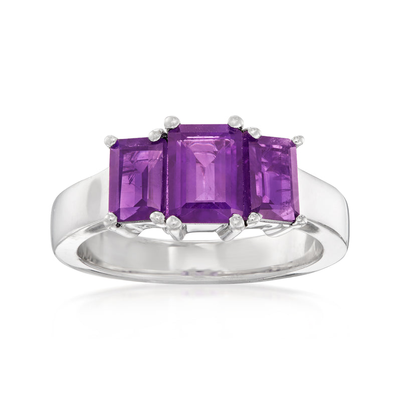 Sterling silver three-stone amethyst ring with purple emerald-cut center stone