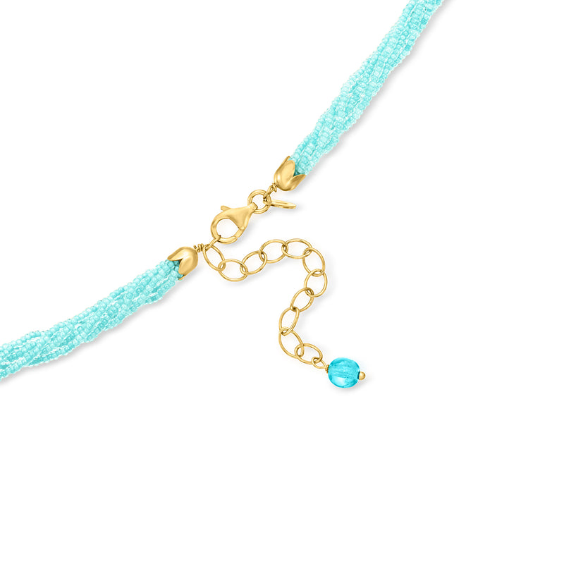 Turquoise bead necklace with gold clasp and round multicolored glass pendant
