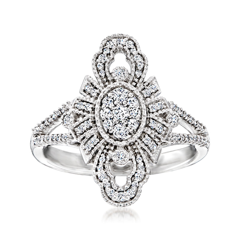 Platinum vintage-style diamond ring with oval center halo and ornate filigree setting