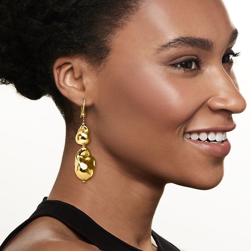 Gold textured teardrop drop earrings on earwire hooks, baroque-style dangling