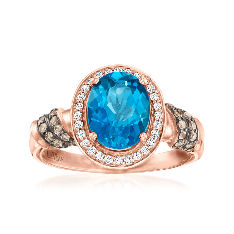 Le Vian rose gold ring with oval deep blue topaz and diamond halo