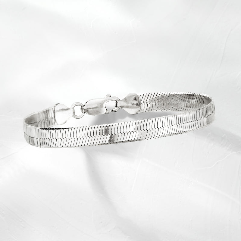 Sterling silver herringbone bracelet, ridged links and clasp detail