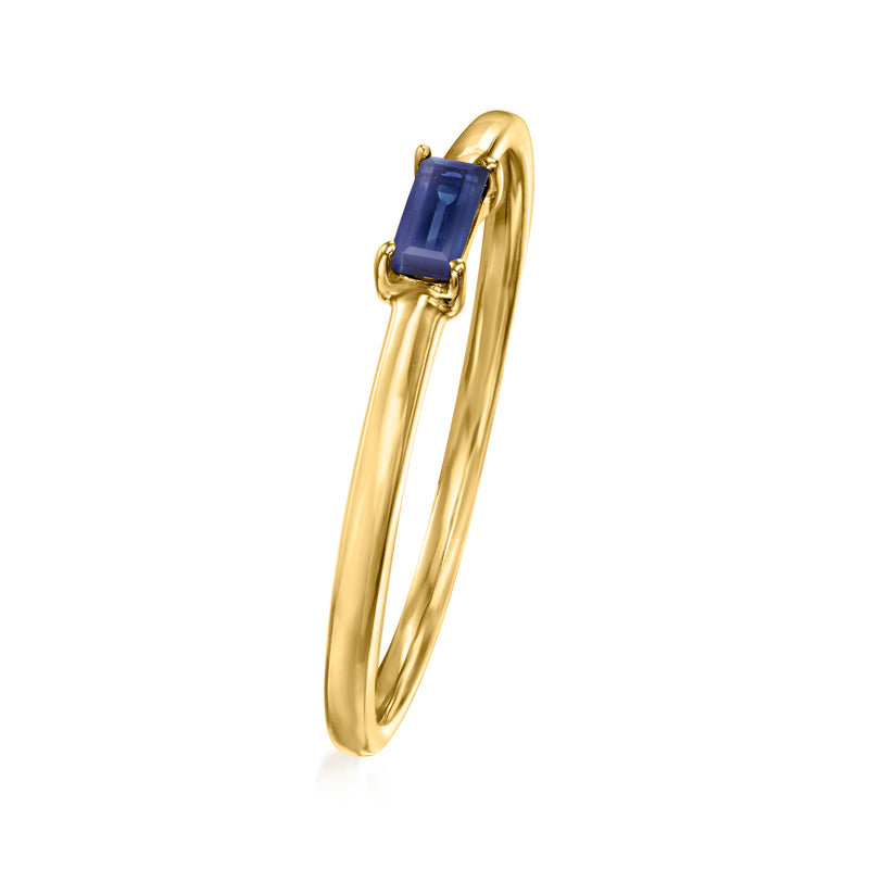 14kt yellow gold sapphire ring with raised rectangular blue stone and prongs