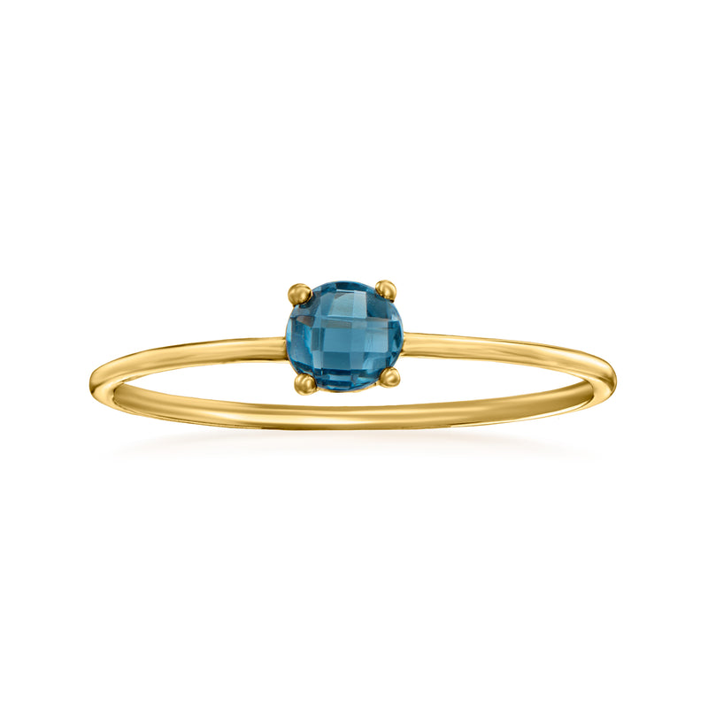 14kt yellow gold ring with blue topaz gemstone and four prongs