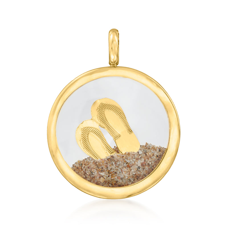Round 14kt yellow gold sand pendant with monogram-style design in the center