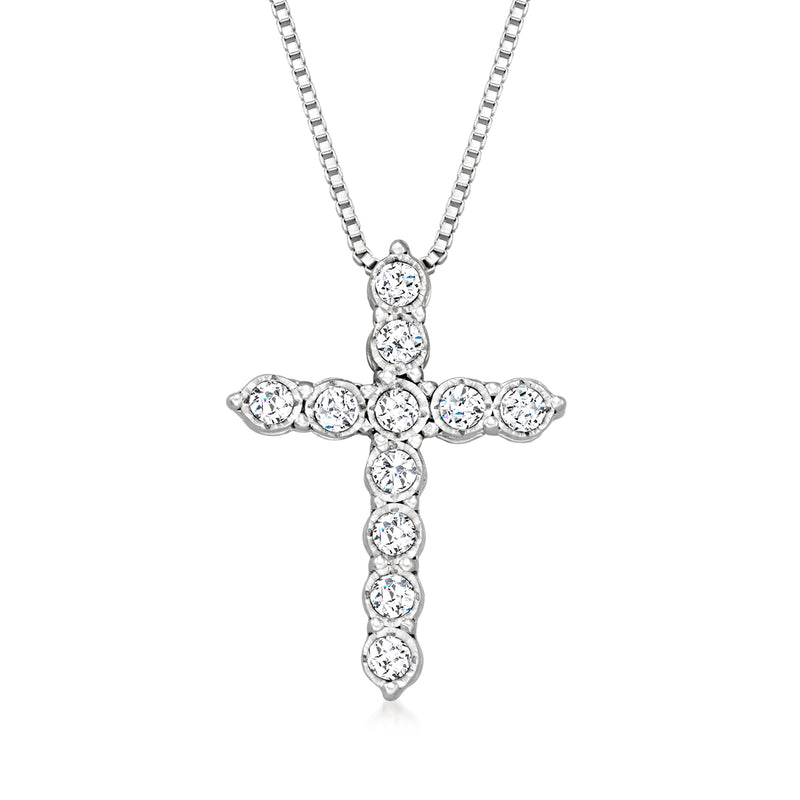 Sterling silver cross pendant necklace with round diamond accents