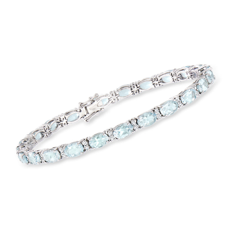 Aquamarine tennis bracelet in 14kt white gold with light-blue oval stones and accents