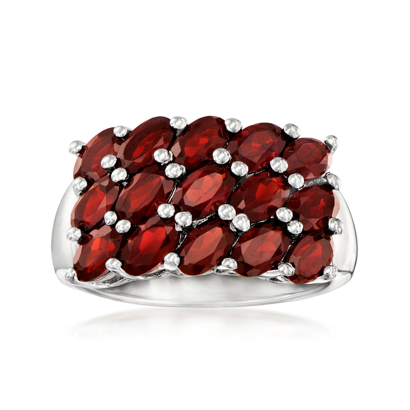 Sterling silver three-row garnet ring with oval red stones and round silver accents