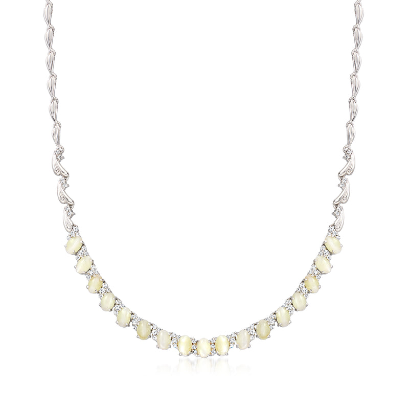Vintage 18kt white gold necklace with yellow chrysoberyl stations and diamond accents