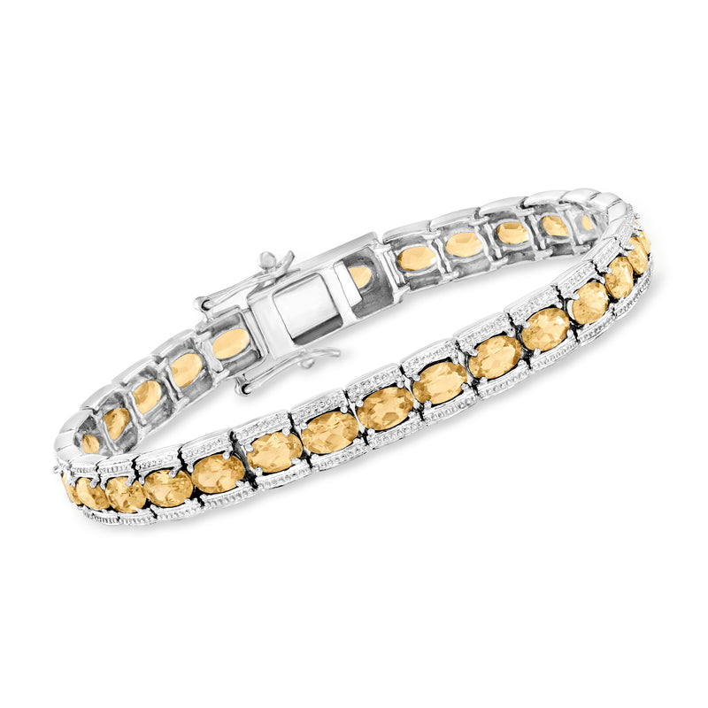 Citrine tennis bracelet in sterling silver with yellow oval gemstones in row