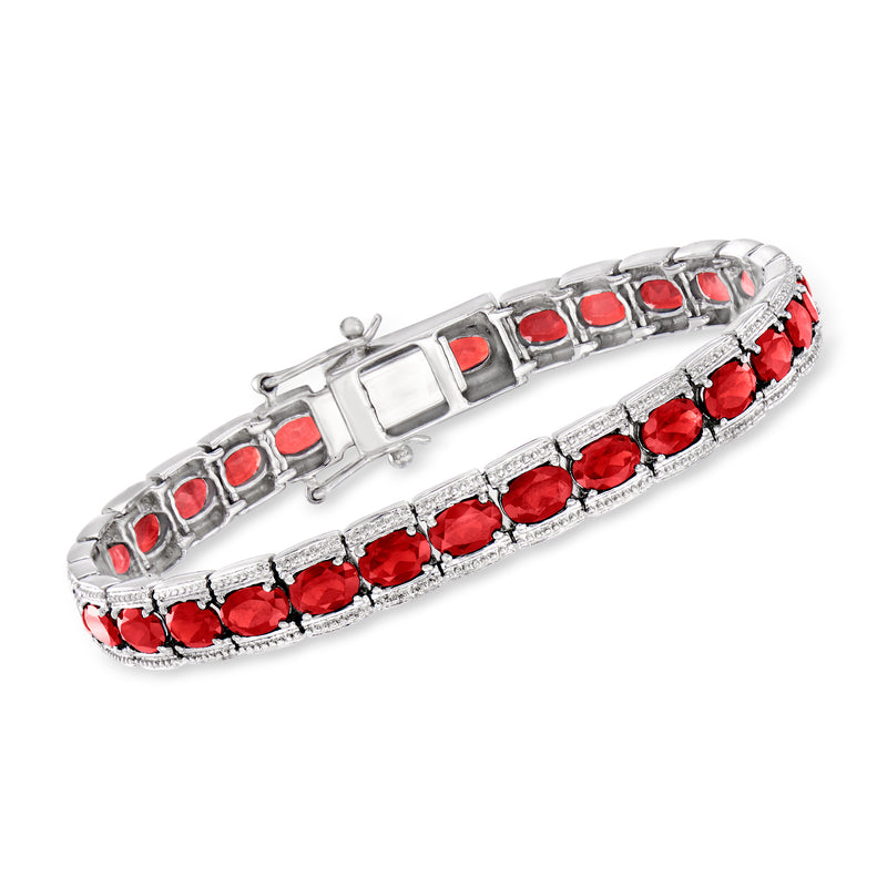 Sterling silver tennis bracelet with red round garnet stones, hinged with box clasp