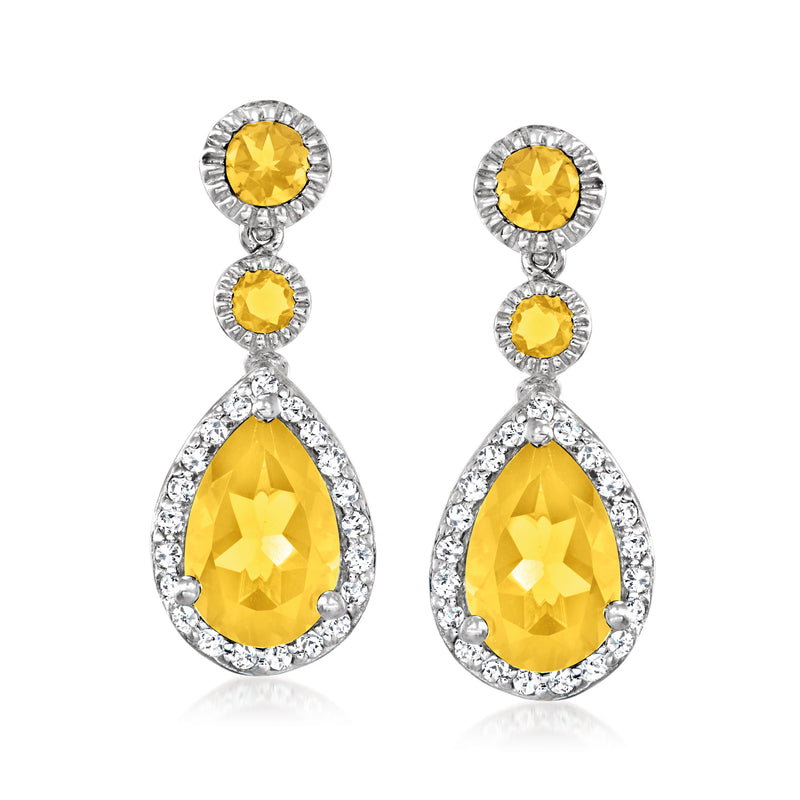 Sterling silver drop earrings with yellow citrine teardrop and round halos of clear stones