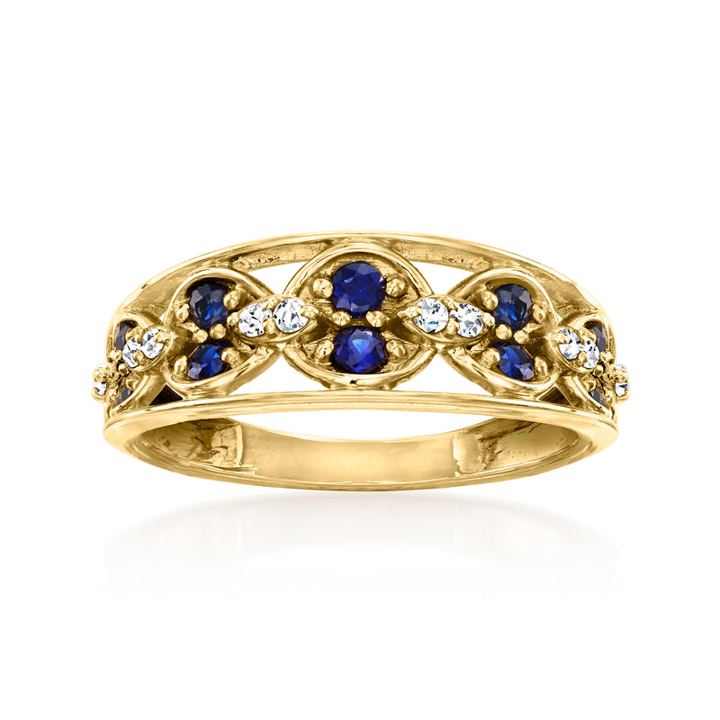 14kt yellow gold ring with blue sapphire clusters and round diamond accents