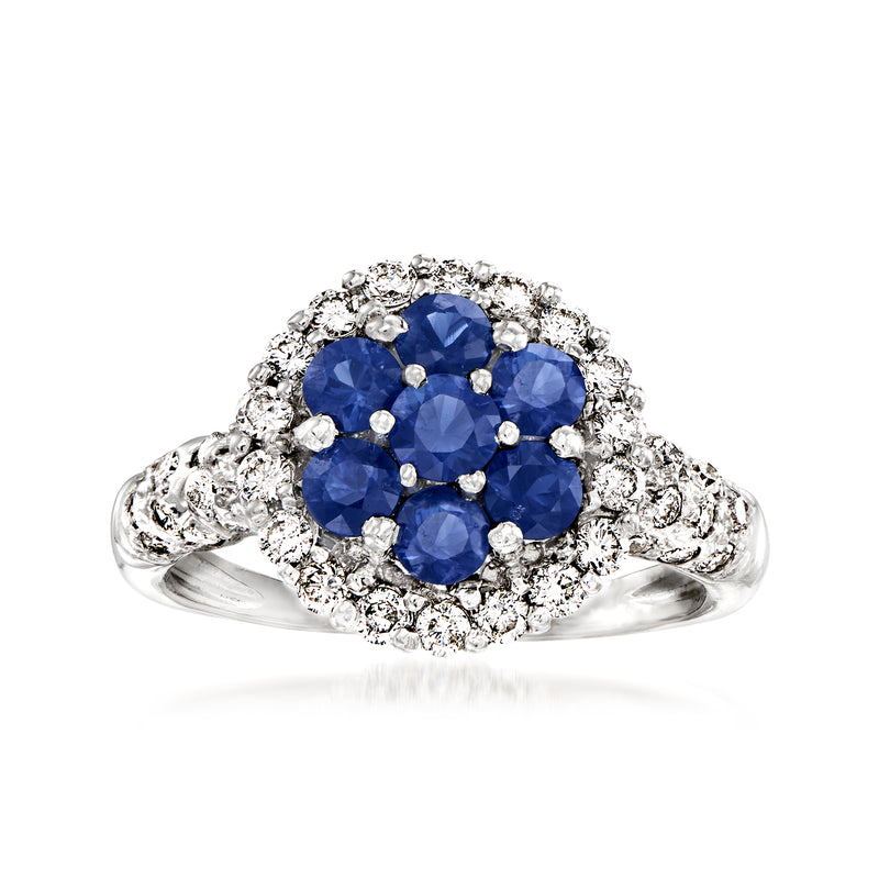 18kt white gold cluster ring with sapphire center stones and diamond halo