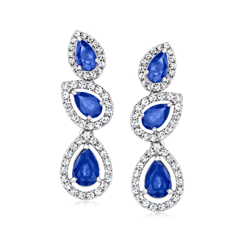 Blue sapphire teardrop drop earrings with diamond halos in 14kt white gold