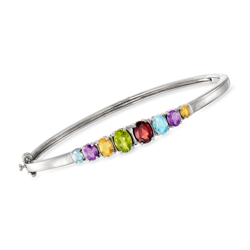 Sterling silver bangle bracelet with multicolor gemstone row and clasp