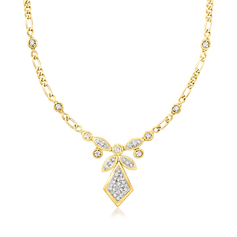 Two-tone gold figaro-link drop necklace with diamond-look center pendant and round accents