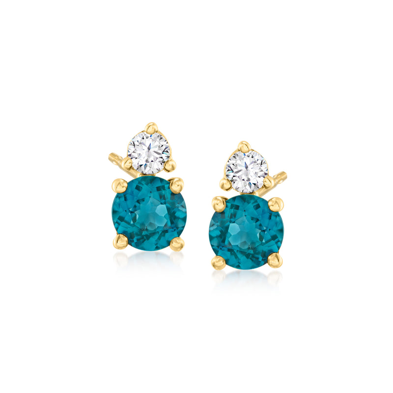 14kt yellow gold post earrings with blue topaz and round diamonds