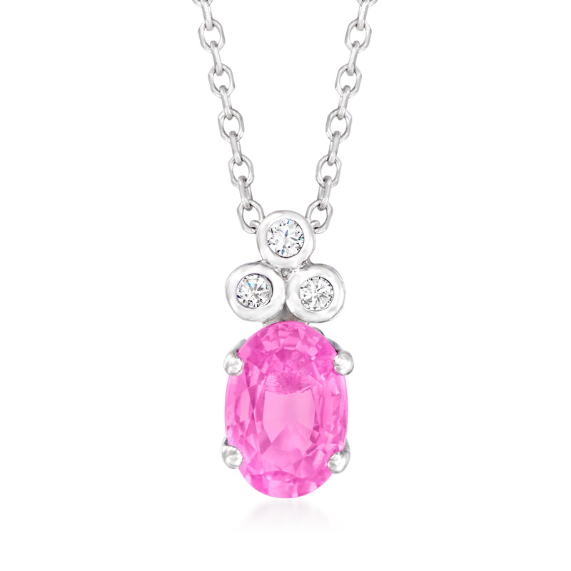 Pink sapphire oval pendant with three round diamond accents on white gold chain