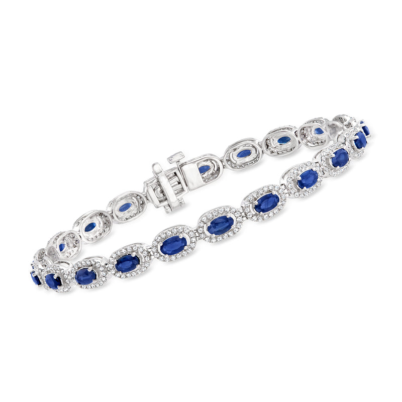 14kt white gold bracelet with oval blue sapphires and diamond accents, hinged clasp